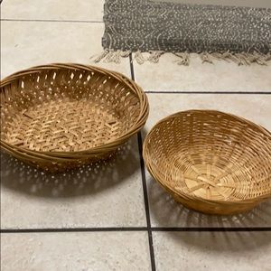 Set of two similar woven bowls
